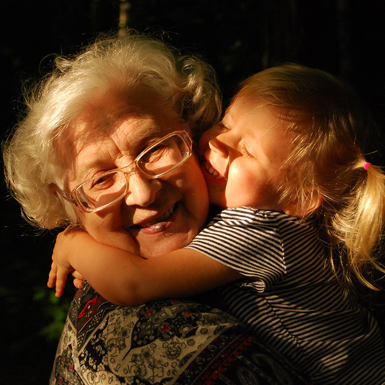 Elderly woman with grandchild